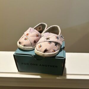 Toms Pink Canvas Baby Slip-Ons with Multicolor Bug Embroidery